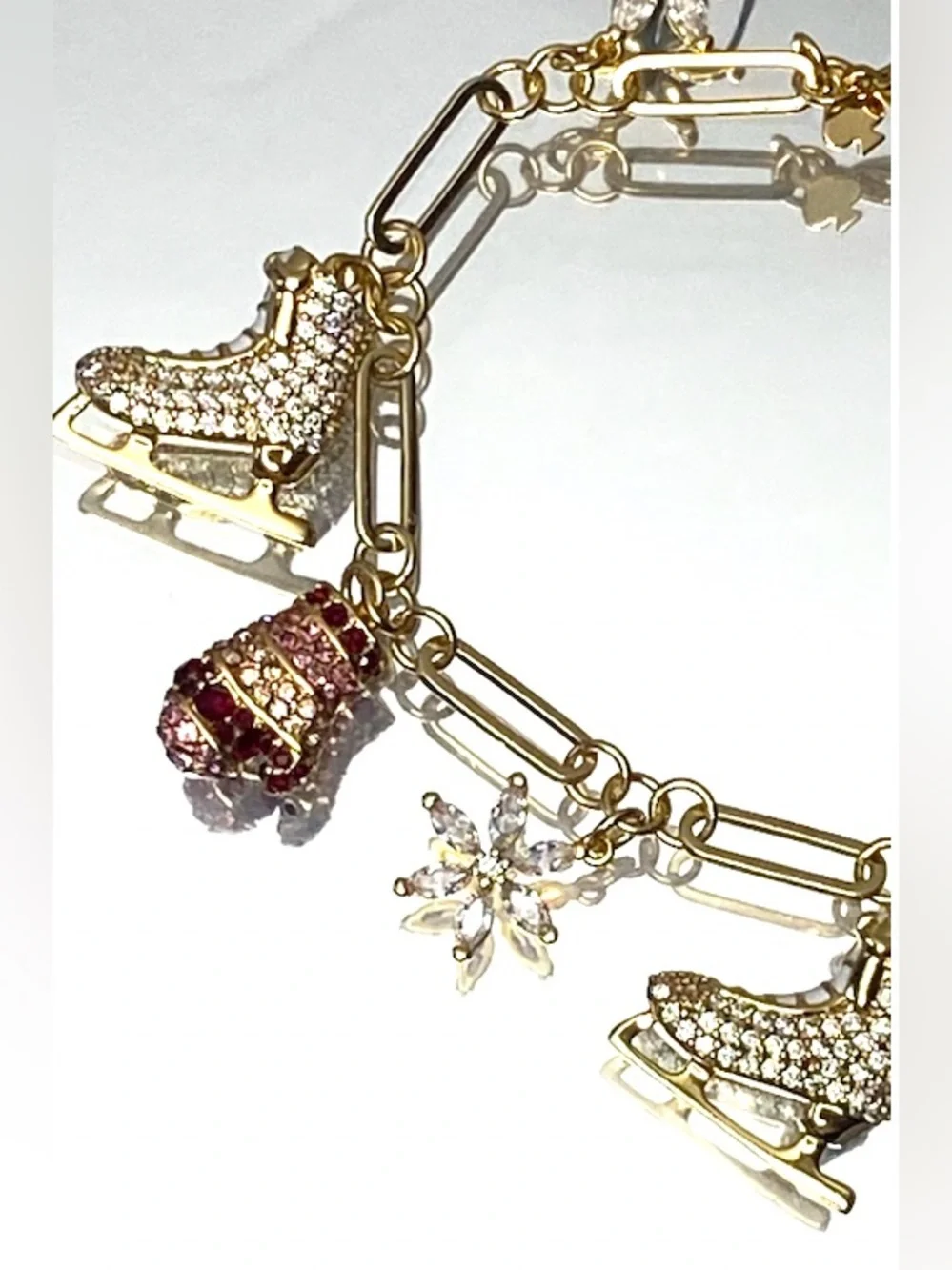 kate spade Gold-Tone Ice Skate & Snowflake Charm Bracelet with Pink Accents - Picture 8 of 9